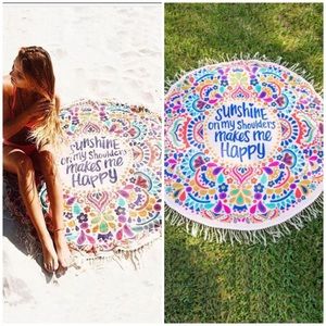 Multicolored circular beach throw.